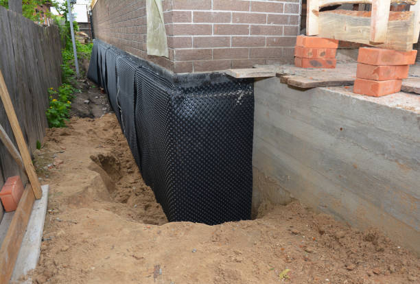 Happy homeowners after waterproofing job in Midland Park